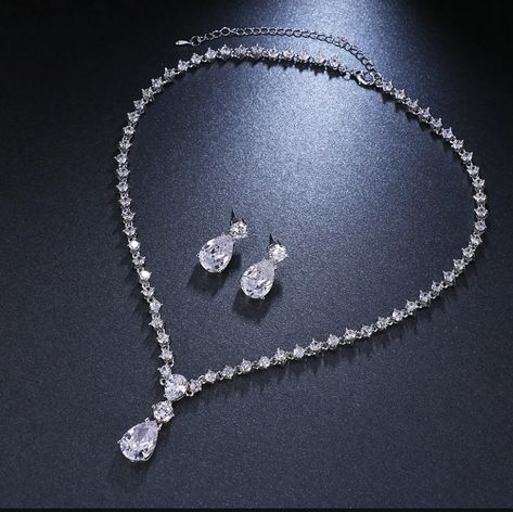 Simple Cubic Zirconia Crystal Women Earrings Necklace Set. #jewelrydesigner #jewelry #gold #necklace #jewellery #jewelrydesign #jewelrylovers #earrings #earring #women #womenproducts #beauty Mother Of The Groom Jewelry, Bride Jewelry Set, Earrings Necklace Set, Costume Jewelry Sets, Crystal Bridal Earrings, Wedding Costume, Luxury Earrings, Paris Outfits, Women Earrings