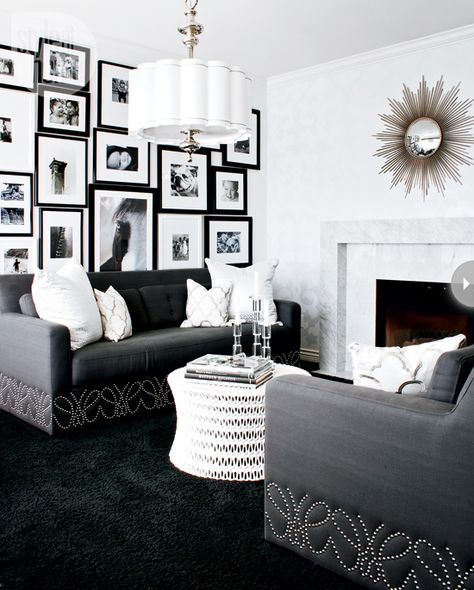 Hollywood drama /   Black-and-white has never looked so decadent. Inspired by a tuxedo, this living room seduced us with its old Hollywood glamour from the crisp white walls to the luxe black carpet to the glitzy nailhead details and lighting fixture. Glamour Living Room Decor, Black And White Living Room Decor, White Living Room Decor, Glamourous Bedroom, Best Leather Sofa, Dark Carpet, Glamour Decor, Black And White Living Room, Glam Bedroom