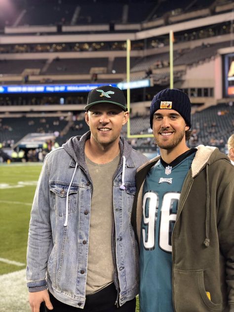 Philadelphia Phillies Rhys Hoskins and Aaron Nola attend an Eagles game Rhys Hoskins, Baseball Backgrounds, Aaron Nola, Eagles Game, Dancing On My Own, Phillies Baseball, Squeeze Pouch, Monday Night, Baseball Softball