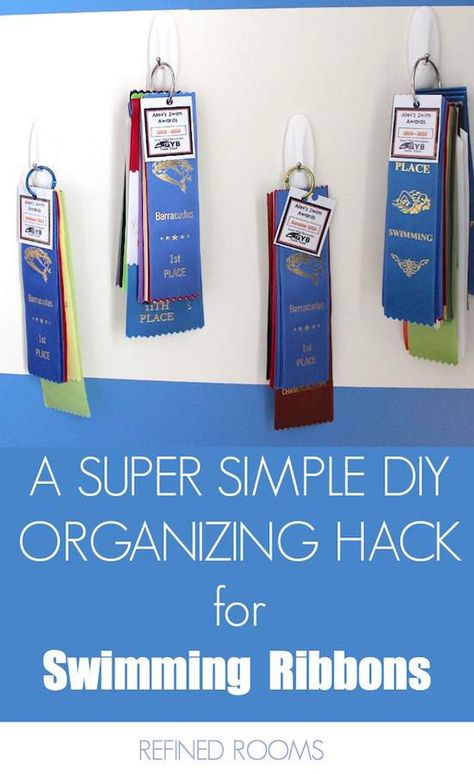 Drowning in a collection of swim ribbon clutter? I was too! Check out this quick & easy DIY solution for organizing swim ribbons! #RefinedRooms #organizinghack #DIYOrganizingsolution #swimribbonstorage #swimribbondisplay #swim ribbon #awardribbonstorage #awardribbondisplay # Ribbon Display Ideas, Award Ribbon Display, Swim Ribbons, Show Ribbon Display, Horse Show Ribbons, Diy Organizing, Ribbon Display, Ribbon Organization, Award Ribbons