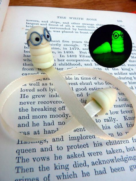 Would you like to share a book with me? We can devour one page at a time together! I can 'glo' all night!  This little glow worm makes the perfect reading companion! And at the end of the night, his soft glow will keep you company!   A handmade polymer clay glow worm will sit on top of your book, proudly marking your page, while a ribbon runs down to the pages to where his tail sticks out at the bottom!   Why not take home this little glow worm today and start an adventure together! Diy Clay Bookmarks, Glow In The Dark Clay Ideas, Clay Worm, Polymer Clay Bookmark Ideas, Clay Bookmark, Polymer Clay Bookmark, Polymer Clay Book Mark, Polymer Clay Projects Diy, Polymer Clay Books