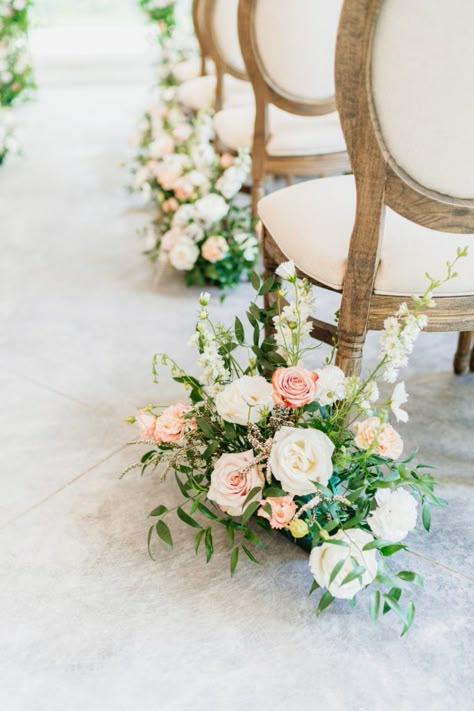 Blush florals details during ceremony Ceremony Aisle Floral Arrangements, Chair Arrangement Wedding Ceremony, Blush Pink Wedding Ceremony, Ceremony Chair Flowers, Wedding Aisle Floral Arrangements, Aisle Arrangements Wedding Ceremony, Pink Aisle Flowers, Aisle Florals Wedding, Wedding Floral Arrangements Ceremony