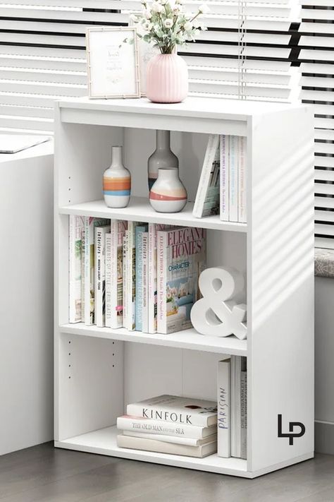 Give well-thumbed novels a place to call home or store essential office supplies with this versatile bookcase, featuring three fixed shelves. This budget-friendly piece is an ideal option for smaller spaces. A neutral finish helps it blend with a variety of color palettes and aesthetics. The manufacturer backs this product with a one-year warranty. #bookcase #standardbookcase White Bookcase Target, Essential Office Supplies, Erin Gates, Shelf Decor, Budget Friendly, Small Spaces, Office Supplies, Bookcase, Old Things