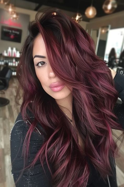 Woman with long, wavy burgundy hair in a salon setting. Off Black Balayage, Unique Dark Hair Color Ideas, Cherry Red Highlights, Cola Hair Color, Cherry Cola Hair Color, Cola Hair, Black Cherry Hair Color, Black Balayage, Cherry Cola Hair