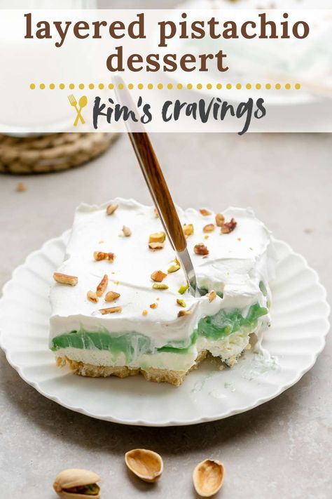 Gorgeous Layered Pistachio Dessert is the most amazing old-fashioned sweet treat passed down from my grandma! It's easy to make with a nutty cookie crust that’s topped with layers of cheesecake filling, pistachio pudding, and Cool Whip. It's always a hit at potlucks, parties and holiday gatherings! Chocolate Pistachio Pie, Pistachio Torte Recipes, Pistachio Lush Dessert, Pistachio Pudding Dessert, Jello Pudding Desserts, Pudding And Cool Whip, Pistachio Pie, Pistachio Dessert Pudding, Cool Whip Desserts