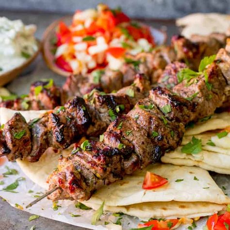 Greek Lamb Souvlaki Kebabs Lamb Souvlaki Recipe, Lamb Souvlaki, Homemade Flatbread Recipes, Lamb Kabobs, Souvlaki Recipe, Greek Lamb, Lamb Kebabs, Lamb Skewers, Homemade Flatbread