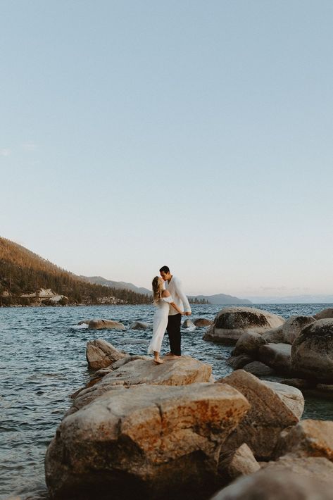 Dreamy engagement photos at Lake Tahoe are just what the soul needs! Shannon and Luke's Lake Tahoe engagement photos turned out so good! Obsessed with this adventure engagement session out on the lake and in the trees. If you're looking for some artsy engagement photos, check out my blog! Scenic Engagement Photos, Engagement Photos By Lake, Engagement Photos Trees, Lake Tahoe Proposal, Cliff Engagement Photos, River Shoot, Tahoe Engagement Photos, Lake Engagement Pictures, Lake Tahoe Couple Pictures