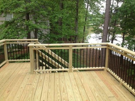 Decks.com. Deck Idea Pictures Baluster Ideas, Second Story Deck Ideas, Merbau Decking, Deck Rails, Deck Addition, Second Story Deck, Metal Balusters, Deck Flooring, Deck Pictures