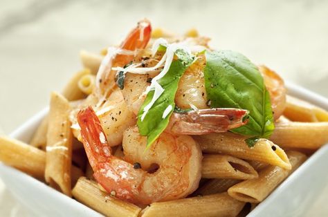 A bowl of whole-wheat pasta with sautéed shrimp. Shrimp Pasta Salad, Cajun Shrimp Pasta, Creamy Tomato Sauce, Swim Meet, Good Foods To Eat, Shrimp Pasta, Penne Pasta, Healthy Diet Plans, How To Cook Shrimp