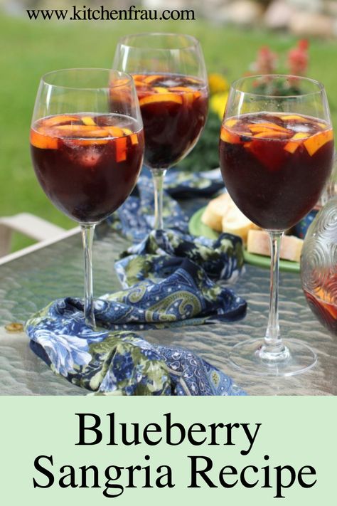 Sip away the summer with our irresistible Blueberry Sangria, a pitcher full of summer delight right from Kitchen Frau! Bursting with fresh blueberries and brimming with festive cheer, this easy-to-follow recipe is guaranteed to be a crowd-pleaser. Indulge in a pour of summer fun, one glass at a time. Blueberry Wine Sangria, Blueberry Sangria Recipes, Blueberry Sangria, Sangria Drink, Blueberry Wine, Strawberry Sangria, Fruity Wine, Perfect Summer Drink, Homemade Juice