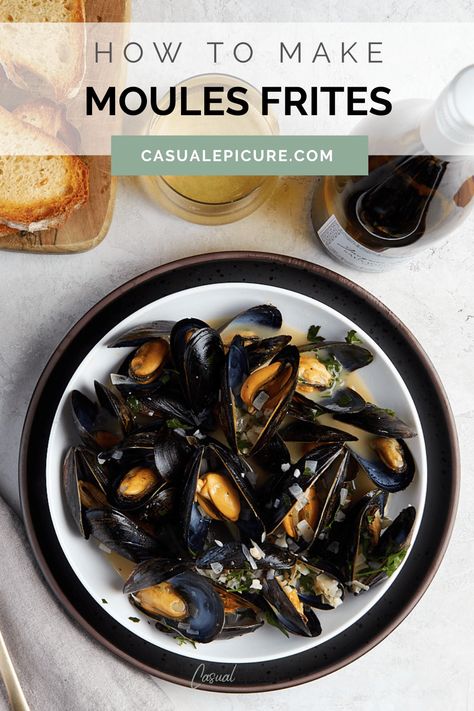 This easy recipe for Moules Frites is made with fresh mussels that are steamed in a broth of white wine, shallots, and garlic, then served with crispy French fries. Perfect for a date night dinner at home, this recipe brings the taste of a seaside bistro to your kitchen. It's the kind of meal that looks fancy but is actually a breeze to make. Serve with crusty bread and a side of fries for a complete and satisfying meal. French Mussels Recipe, Steamed Mussels Recipe, Date Night Dinner At Home, Maryland Style Crab Cakes, Mini Crab Cakes, Steamed Mussels, Date Night Dinner, Mussels Recipe, Crispy French Fries