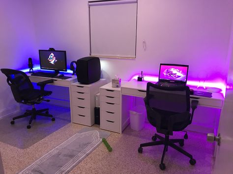 His and hers office. All white with LED accent color His And Her Computer Room, His Her Game Room, Husband And Wife Gaming Room, Bf And Gf Gaming Setup, Couples Gaming Room Setup Minimalist, Gaming Setup For Couples, 2 Person Gaming Room, Gaming Room 2 People, Dual Gaming Setup Couple