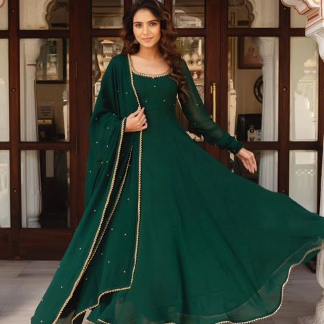 *GREEN HANDWORK ANARKALI 💚🌸✨* for order what's app 7997018094 Price 1299/- Be The Talk Of The Town With This Beautiful Handwork Anarkali With Dupptta! This piece is made from Fox Georgette Fabric with a beautiful intricate motif zari Handwork, creating an elegant and eye-catching look. The Dress is the perfect way to make a statement and show off your impeccable sense of style. Get your hands on this must-have set and elevate your wardrobe to the next level! *DETAILS* ✓Material:- Fox Ge... Haldi Outfit Bridesmaid, Green Anarkali Dress, Indian Long Dress, Suits For Women Indian, Haldi Outfits, Women Suits Wedding, Hand Embroidery Work, Mehendi Outfits, Gown With Dupatta