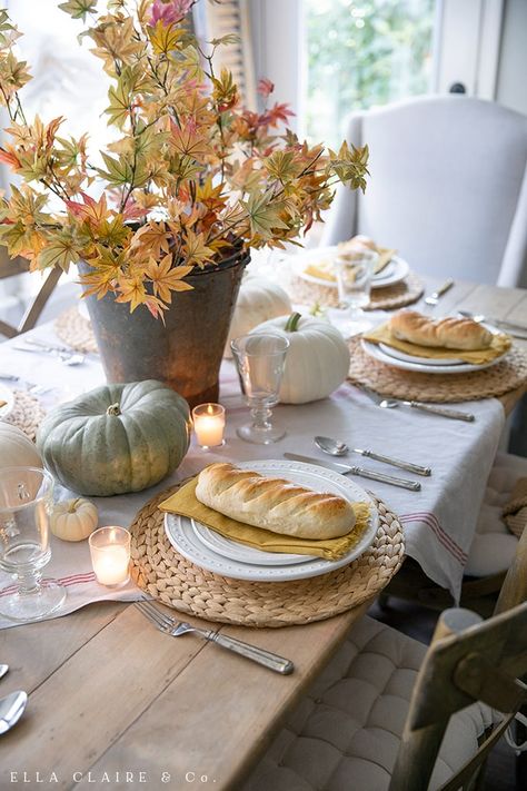 How to put together this golden yellow fall tablescape with autumn leaves and heirloom pumpkins, candlelight, and cozy touches perfect for entertaining family and friends for Thanksgiving or a special dinner. Heirloom Pumpkins, Cozy Candlelight, Vibeke Design, Fall Table Settings, Fall Thanksgiving Decor, Autumn Decorating, Fall Tablescapes, Elegant Fall, Special Dinner