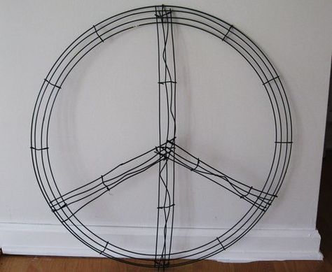 IMG_1412 Hula Hoop Peace Sign Diy, Diy Peace Sign Wreath, Peace Sign Wreath Diy, Diy Peace Sign, Peace Sign Wreath, Wire Clothes, Peace Crafts, Peace Wreath, Hippie Crafts