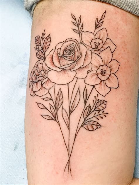 a rose marigold daisy and narcissus tattoo designs women small ideas - Yahoo Search Results Daisy And Narcissus Tattoo, Floral Bouquet Tattoo, Metamorphosis Of Narcissus, Tattoo Designs Women, Narcissus Tattoo, Hanging Flower Arrangements, Carnation Tattoo, Rose Flower Tattoos, Bouquet Tattoo