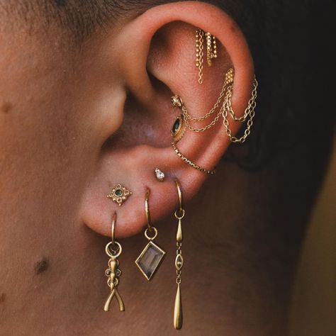 Ear update ✨ @larsmakes did a cute lil stacked lobe with the cutest lil “Lina” end from @m.us.hroom | Instagram Piercing Stacks, Piercing Business, Ear Piercing Curation, Piercing Curation, Different Types Of Ear Piercings, Stacked Lobe, Piercing Styles, Triple Lobe Piercing, Eyebrow Piercings