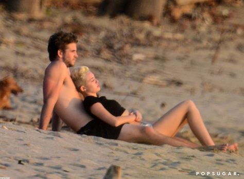 Pin for Later: Jet Set With the Best Celebrity Vacations  Miley Cyrus and Liam Hemsworth watched the sunset in Costa Rica while vacationing in January 2013. Miley Cyrus And Liam Hemsworth, Costa Rica Pictures, Hunger Games Actors, Vacation Alone, Miley And Liam, Toned Tummy, Couples Vacation, Liam Hemsworth, Costa Rica Travel