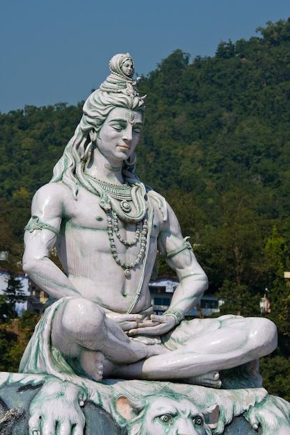 Photo statue shiva hindu idol on the riv... | Premium Photo #Freepik #photo #buddha-statue #indian-god #hindu-god #indian-temple Bhagwan Shiv, Mahadev Hd Wallpaper, Rama Image, Mahakal Shiva, Lord Rama Images, Rishikesh India, Shiva Tattoo, Image Instagram, Lord Shiva Hd Wallpaper