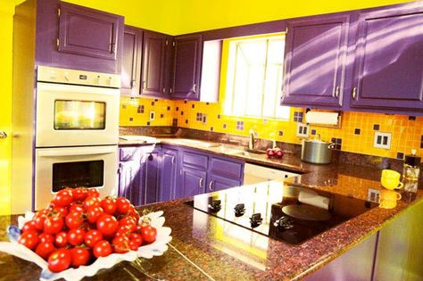 This kitchen is painted and tiled with purple and yellow which are complementary colors. These colors make the room very bright and vibrant.  http://www.apartmenttherapy.com/ny/room-for-color-2010/kaleidoscopes-of-color-room-for-color-roundup-130460 Yellow And Purple Kitchen, Yellow And Purple Room, Kitchen Remake, Purple Kitchen Decor, Kitchen Purple, Mustard Kitchen, Decor Makeover, Kitchen Colours, Kitchen Island Storage