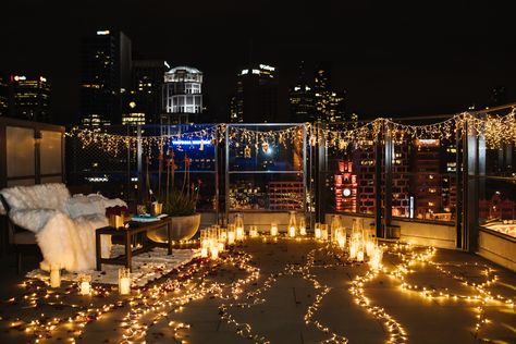 Candle Light Proposal Ideas, Rooftop Proposal Night, City Lights Proposal, Marry Me Lights Proposal, City Proposal Ideas, Fairy Lights Proposal, Rooftop Proposal Decorations, Fairy Light Proposal, Classy Proposal Ideas