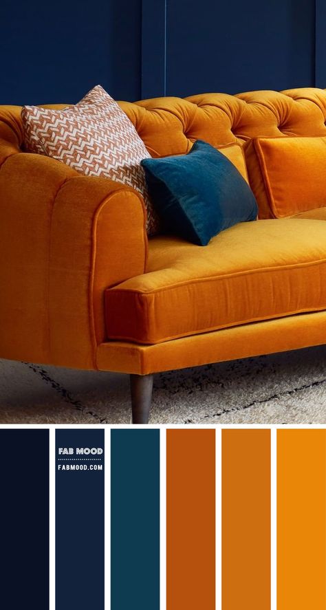 Deep hues can work wonders in a living room to create a calm, soothing, inviting feel, and navy blue is a stylish choice. Living room with navy blue walls? YES, Please! Smart and sophisticated, navy is... Blue And Orange Living Room, Cottagecore Living, Orange Couch, Orange Sofa, Living Room Orange, Living Room Color Schemes, Room Color Schemes, Blue Living Room, Blue Bedroom