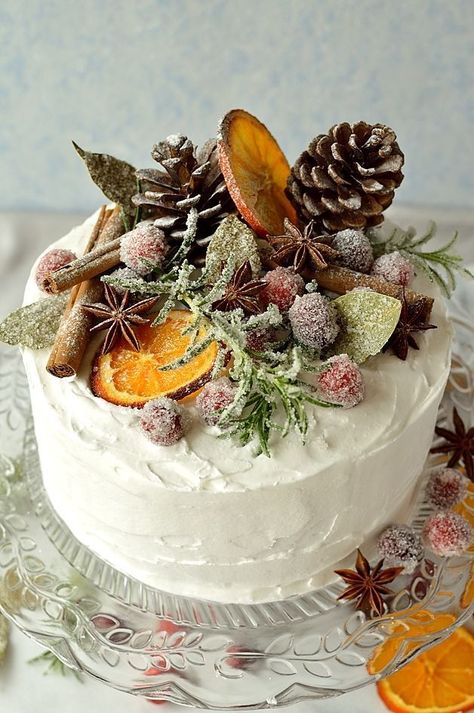 Gingery Christmas fruitcake topped with marzipan, royal icing, sugared cranberries, rosemary and bay leaves, dried orange slices, pine cones and whole spices  - Domestic Gothess Christmas Fruitcake, Fruit Cake Christmas, Christmas Cake Designs, Sugared Cranberries, Torte Cupcake, Christmas Cake Decorations, Xmas Cake, Christmas Fruit, Christmas Cake Recipes