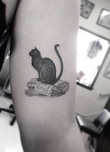 28 Examples of Small Cat Tattoos Small Book Tattoo, Tattoo Quotes For Men, Tattoo Son, Black Cat Tattoos, Cat Tattoo Designs, Tattoo Cat, Latest Tattoos, Book Tattoo, Feather Tattoos