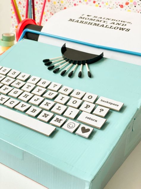 Make Your Own Cardboard Typewriter • DIY Typewriter Craft Cardboard Typewriter, Cardboard Props, Pipe Cleaner Crafts, Recyclable Materials, Diy Cardboard, Grown Ups, Play Toys, Cardboard Tube, Wax Paper