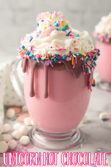 Unicorn Hot Chocolate is a warm and creamy pink-colored white chocolate drink topped with lots of whipped cream, colorful sprinkles, and marshmallows! White Chocolate Drink, Unicorn Hot Chocolate, Cute Drinks, Chocolate Drink, Hot Chocolate Recipes, Cute Desserts, Milkshakes, Hot Drinks, Marshmallows