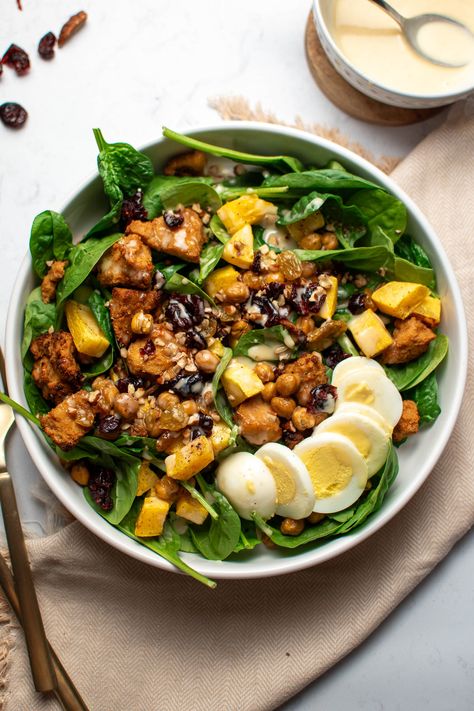 Enjoy the flavors of fall with this low-carb Fall Harvest Cobb Salad! Featuring tofu, butternut squash, chickpeas, and a honey mustard dressing, this healthy recipe is perfect for a nutritious meal. Harvest Cobb Salad, Raw Spinach, Honey Mustard Dressing, Crispy Tofu, Mustard Dressing, Main Dish Salads, Bean Curd, Roasted Butternut, Roasted Butternut Squash