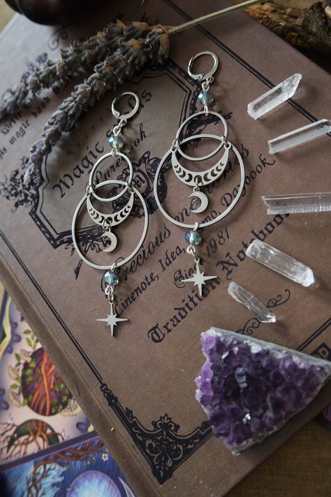 * Stunning statement Moon and Stars earrings which will give your outfit a mystical touch.  * These beautiful dangling earrings have a witchy, bohemian feel to them. * Stainless steel! * The total length of the earrings is approximately 10 cm (aprox 4 inches), hook included.  * They come in a pretty little burlap pouch 🖤 Witchy Necklace, Witchy Boho, Stars Earrings, Mystical Jewelry, Moon And Star Earrings, Witch Jewelry, Witchy Jewelry, Magical Jewelry, Celestial Jewelry