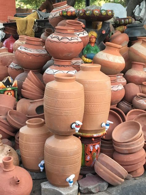 A traditional clay pot for sale modernized with a plastic water dispenser Earthen Pots, Earthen Water Pot In Kitchen, Clay Pots With Lids, Ceramic Water Dispenser, Clay Pot With Lid, Clay Cooking Pots, Disney Inspired Nursery, Clay Cooking Pot, Kitchen Gadgets Unique