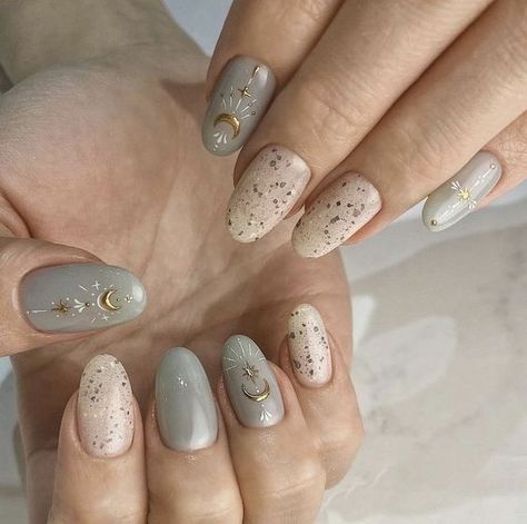 Smooth light grey nail polish with gold celestial nail arts on medium round nails Nude Witchy Nails, Witchy Nail Designs Short, Simple Witchy Nails, Round Nail Designs, Colors Nails, Witchy Nails, Nails Gel Nails, Toe Nail Color, Magic Nails