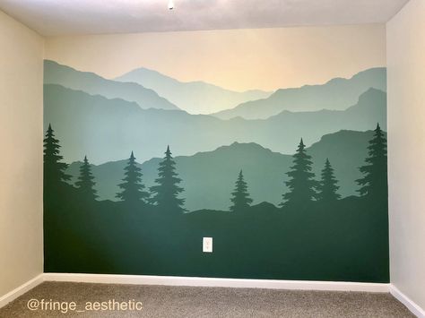 Created a mountain mural for my baby’s room! So inspired by what I’ve seen on Pinterest 💫. This is my version! Enjoy!   #Nursery  #Room  #Mural  #MountainNursery  #KidsBedroom  #Bedroom  #WallMurals  #BedroomPaint  #BabyRoom  #BedroomDecor  #BedroomWall  #Wall  #Baby  #BabyNursery #paintedmural #mountainmural Green Mural Wall, Mountain Wall Painting, Mountain Wall Mural, Mountain Mural, Kids Room Murals, Forest Mural, Forest Wall Mural, Nursery Mural, Casa Country