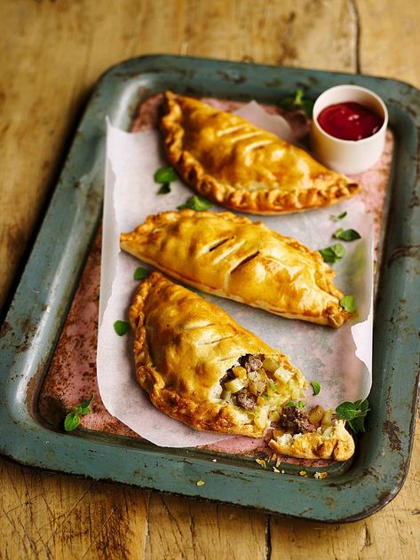 Cornish Pasties - get recipe here: http://www.dailymail.co.uk/femail/food/article-3266722/Emma-s-family-feasts-Cornish-pasties.html Cornish Pasty, Pasty Recipe, Cornish Pastry, Australian Meat Pie, Savory Hand Pies Recipes, Hand Pies Savory, Pasties Recipes, Cornish Pasties, Clean Eating Vegetarian