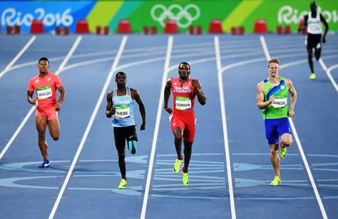 RIO DE JANEIRO, BRAZIL - AUGUST 12: Julian Jrummi Walsh of Japan, Baboloki Thebe of Botswana, Lalonde Gordon of Trinidad and Tobago and Luka Janezic of Slovenia competes during the Men's 400m Round 1 on Day 7 of the Rio 2016 Olympic Games at the Olympic Stadium on August 12, 2016 in Rio de Janeiro, Brazil. (Photo by Quinn Rooney/Getty Images) 2016 Olympic Games, Olympic Stadium, 400m, Rio 2016, August 12, Day 7, Botswana, Olympic Games, Slovenia