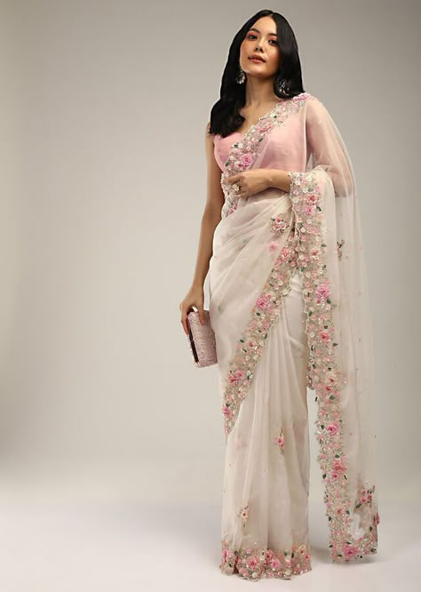 Organza Saree With Floral Embroidery For Reception, Reception Organza Saree With Floral Embroidery, Elegant White Pre-draped Saree With Floral Embroidery, White Floral Embroidered Pre-draped Saree For Wedding, Off White Traditional Wear With Floral Embroidery For Reception, Off White Floral Embroidered Traditional Wear For Reception, White Tissue Silk Traditional Wear With Floral Embroidery, White Georgette Pre-draped Saree With Floral Embroidery, Designer White Pre-draped Saree With Floral Embroidery