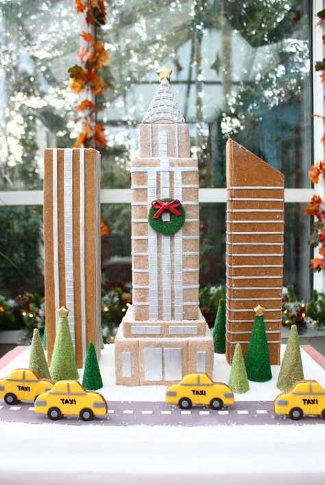 New York Botanical Garden's Gingerbread Adventure by Eat Cake Be Merry New York Gingerbread House, Skyscraper Cake, Gingerbread Construction, Rio Cake, Cake Building, Easy Gingerbread House, Godzilla Party, Superhero Cakes, Gingerbread Inspiration