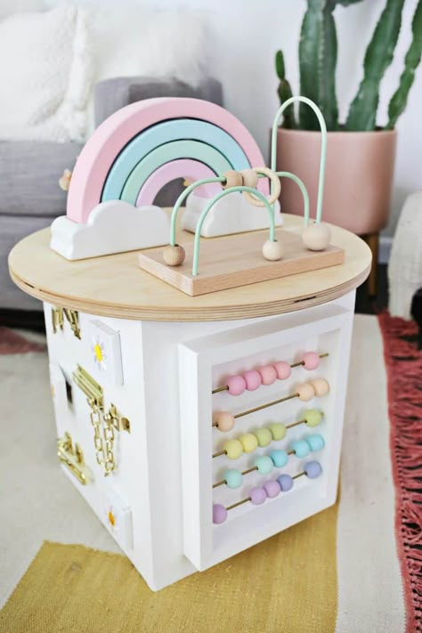 Toddler Activity Center DIY! - A Beautiful Mess Baby Toys Diy, Toddler Activity, Diy Bebe, Activity Center, Diy Toddler, Wooden Baby Toys, Woodworking Projects That Sell, Baby Diy, Baby Sensory