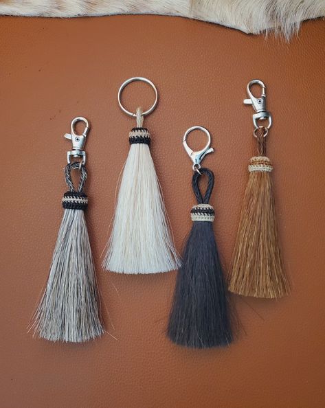 Horse Hair Tassel Key Ring.  Choose, Sorrel (Rusty Brown), Grey, Black, Palomino (Blonde) or Strawberry Red Roan Horse Hair Tassel.   Key Chain for your keys.  Handmade. - Metal keyring is 1.25" in diameter , OR Large Lobster Clasp is 1" long OR Utilitarian Clasp is 1.5" long - Horse Hair Tassel is approximately 4" long. Message me with any questions.  Other colors can be made - message me. See my other Key rings:  https://www.etsy.com/shop/BlueEyesDesignsHB?ref=shop-header-name&listing_id=1772350171&from_page=listing&section_id=31680159 Click this link for my deer horn and horse hair tassel keychain https://blueeyesdesignshb.etsy.com/listing/1772347801 Click this link for my deer horn and feathers keychain:  https://blueeyesdesignshb.etsy.com/listing/1124255099 Tami Blue Eyes Designs www. Horse Hair Keychain Diy, Feather Keychain, Military Cake, Horse Hair Tassels, King Ring, Tassel Keyring, Horse Hair Jewelry, Deer Horn, Tassel Keychain