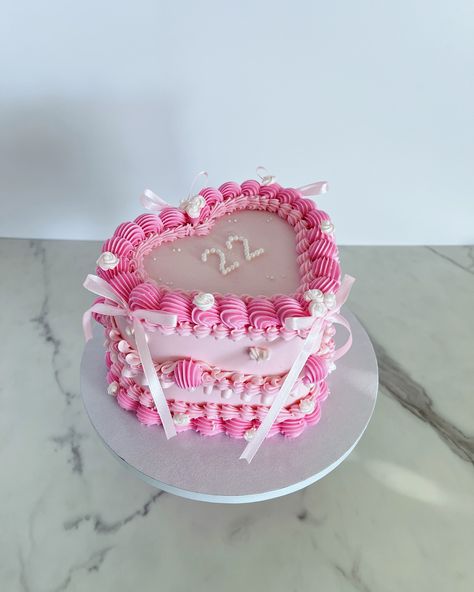 Sweet and delicate heart-shaped birthday cake in pink, celebrating 22 with love!/ Dulce y delicado pastel de cumpleaños en forma de corazón en rosa, ¡celebrando 22 con amor! Custom cakes in Orlando Fl./Tortas personalizadas en Orlando Fl #cakesinorlando #customcakesinorlando #thecitybeautifulcakes #cakeart #orlandofl #heartshapedcakes #heartcake #heartcakesinorlando #tortasdecorazon Pink Vibes, Orlando Fl, Custom Cakes, Birthday Ideas, Orlando, With Love, Birthday Cake, Pastel, Baking