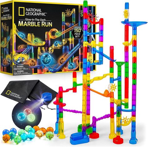 STURDY TIGHT-FIT PIECES – This construction kit is designed to fit together snuggly, so your marble maze won’t fall apart while you play. With 9 sturdy bases, 26 exciting action pieces, and 85 clear smooth-run tube pieces, our kit has countless imaginative configurations. GLOW IN THE DARK MARBLES – The marble run kit includes 6 different colors of glow in the dark glass marbles that shine bright as they zig-zag down the marble run. Also Includes UV light to quickly recharge the marbles. Glow Run, Marble Toys, Marble Maze, Super Sets, Marble Run, Easter Gifts For Kids, Stem Toys, Activity Toys, Blue Marble