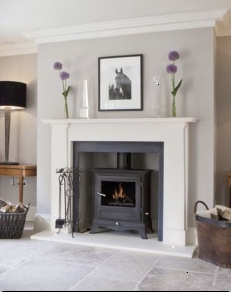 Log Burner Living Room Fire Surround, Fire Surrounds For Log Burners, Orangery Fireplace, Panelling Fireplace, Fireplace Panelling, White Fire Surround, Cream Fireplace, Stove Surround, Wood Burner Fireplace