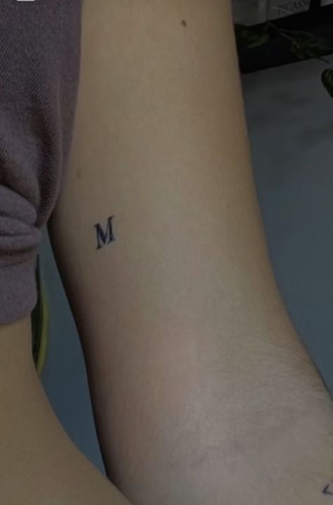 tattoo tattooideas minimalistic tattooart minimal m letter skin inspo inspiration tattoos Initials Tattoo Placement Ideas, Tattoos With Letter J Design, H And M Tattoo, 1 Letter Tattoo, Letter Minimalist Tattoo, M Squared Tattoo, Mini M Tattoo, Letter Tatooes, Dainty M Tattoo