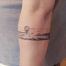 Armband tattoo by Sarah March - Tattoogrid.net Hot Air Balloon Tattoo, Air Balloon Tattoo, Armband Tattoos For Men, Tattoo Band, Balloon Tattoo, Band Tattoos, Forearm Band Tattoos, Free Tattoo Designs, Armband Tattoo Design