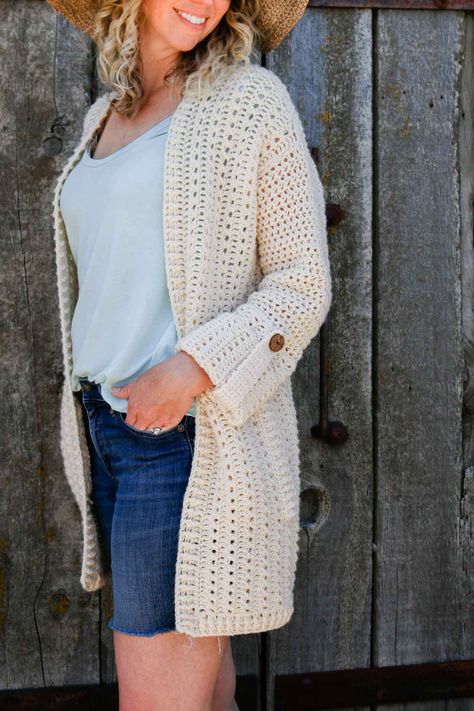 A blonde woman wearing a classic crochet cardigan. Crochet Poncho With Sleeves, Modern Cardigan, Crochet Cardigan Free, Crochet Cardigan Pattern Free, Gilet Crochet, Black Crochet Dress, Crochet Cardigan Sweater, Haken Baby, Crochet Jacket