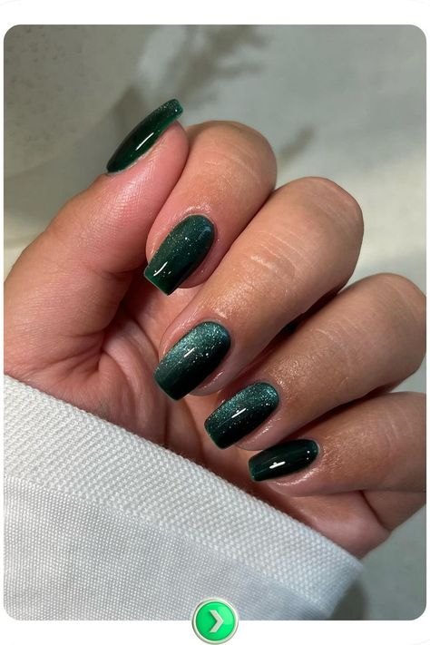 Shimmery forest green short square winter nails with a luxurious touch. This rich green shade with subtle sparkle is perfect for an elegant winter evening style. Square Green Christmas Nails, Green Square Nails Design, Green Short Christmas Nails, Short Korean Nail Designs, Dark Green Nails With Design, Green Christmas Nails Square, Short Christmas Nails Green, Cute Green Nails Short, Short Oval Christmas Nails