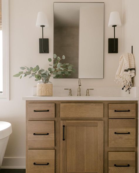 Bathroom With Black Finishes, Wood Vanity Half Bathroom, Birch Bathroom Vanity, Tan Vanity Bathroom, Tan Bathroom Vanity, Light Wood Vanity Bathroom, Bathroom With Black Vanity, Contemporary Half Bath, Birch Bathroom