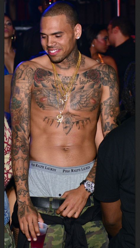 Chris Brown tattoos Chris Brown Chest Tattoo, Chris Brown Tattoos, Celebrity Tattoos Male, Chest Tattoo With Meaning, Chris Brown Shirtless, Brown Tattoos, Best Celebrity Tattoos, Aries Things, Chris Brown And Royalty